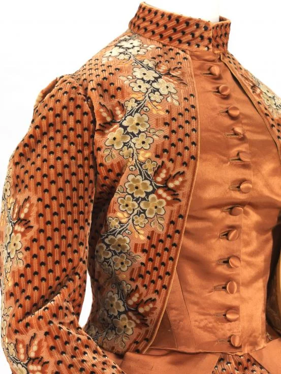 Detail from 1890 silk afternoon dress by Charles Frederick Worth for Worth Paris, from the collection of the National Gallery of Victoria, Melbourne. Purchased with funds donated by Mrs. Krystyna Campbell-Pretty in memory of Mr. Harold Campbell-Pretty, 2015. Courtesy of the National Gallery of Victoria.
