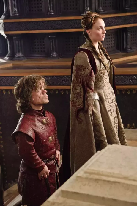  Sansa marries Tyrion Lannister in season three. The Lannister sigil is seen on her arm. 