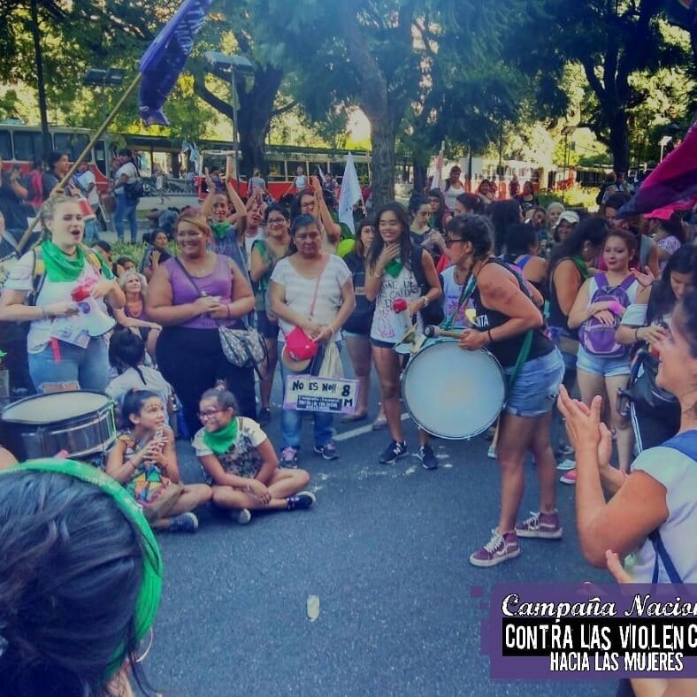  In contrast to the winter months, summer protest wear can significantly look different, though comfort is still paramount, as the sneakers in this image demonstrate. One of my observations during my time in Buenos Aires was that music and chants wer