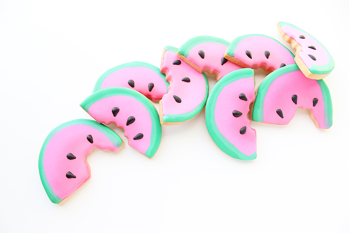 Flat Iced 2 Dozen Minimum 3 Designs (Ex. Watermelons, Suns, & Ice Cream Cones) 3-4 Colors Single Icing Layer & Minimal Icing Accents Some details can increase base price No Hand Painting