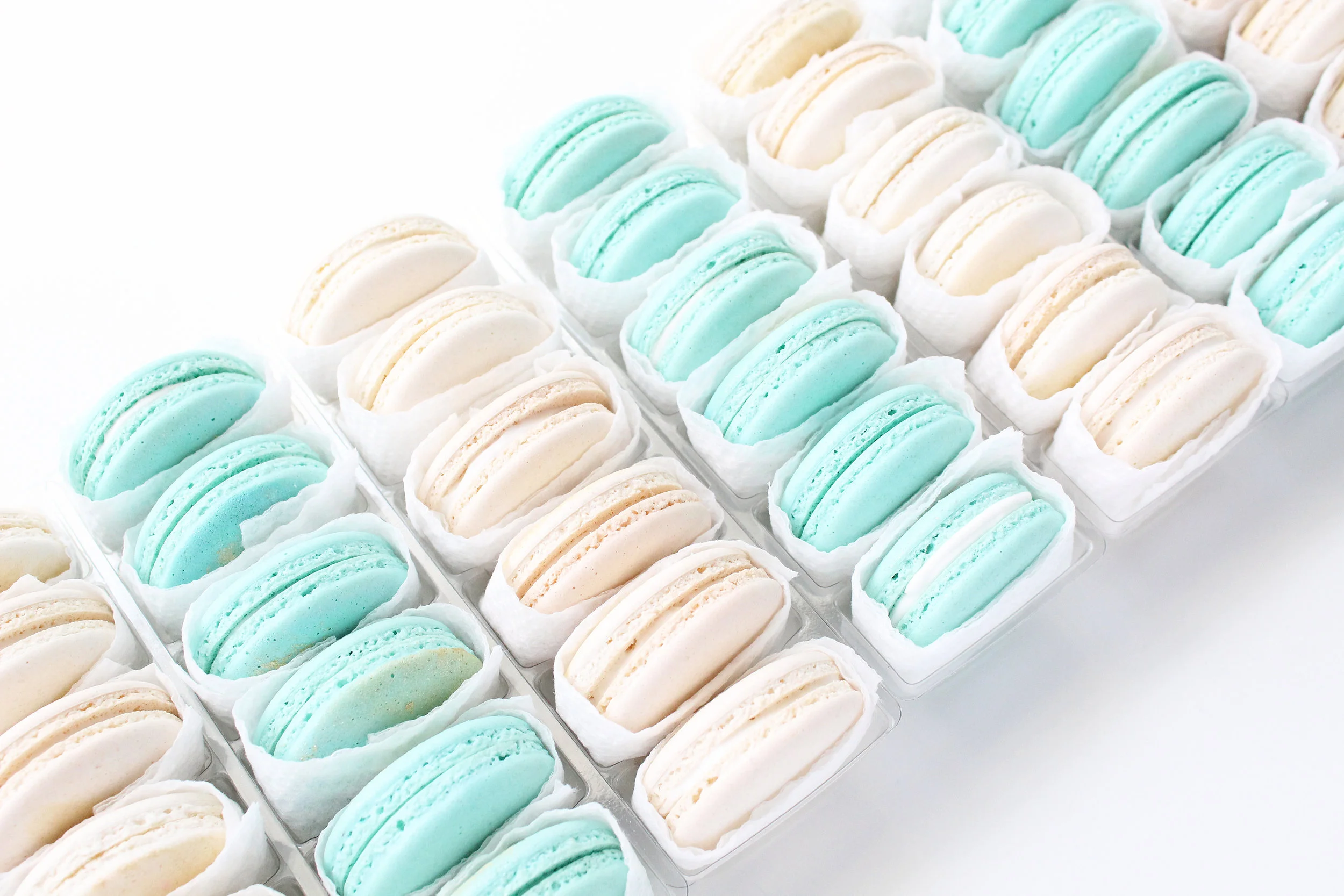Vegan Macarons 2 Dozen Minimum Can Mix & Match any 2 styles of Macarons Any Macaron on our menu can be turned Vegan Hand painted & Shaped priced the same as traditional