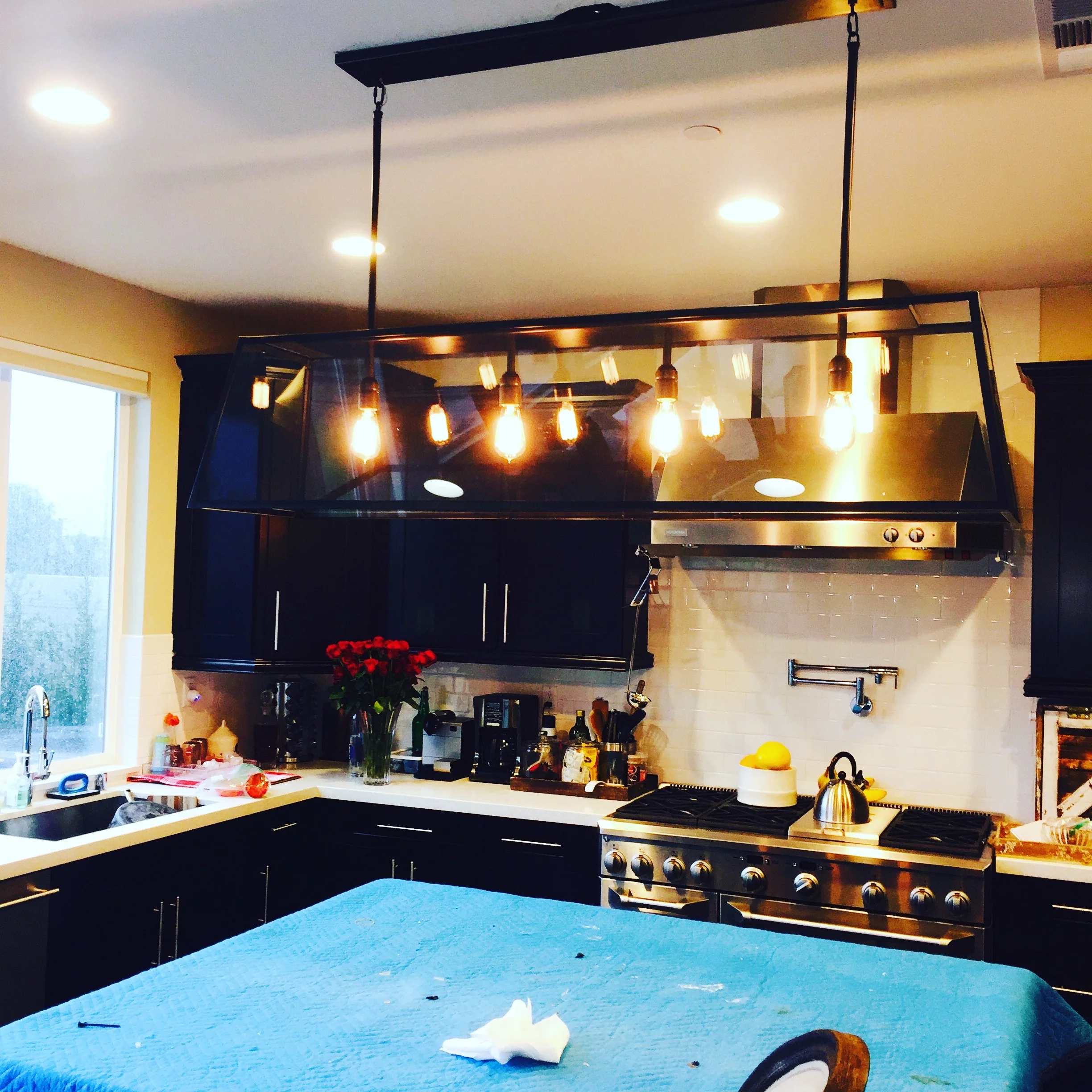 ligth fixture chandellar install above island&nbsp;