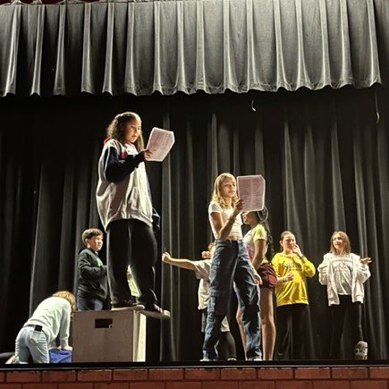 Teaching artists McKinnley  Aitchison and Daniel Coleman working with the Flipside afterschool program at St Paul's Highland Park Middle School.