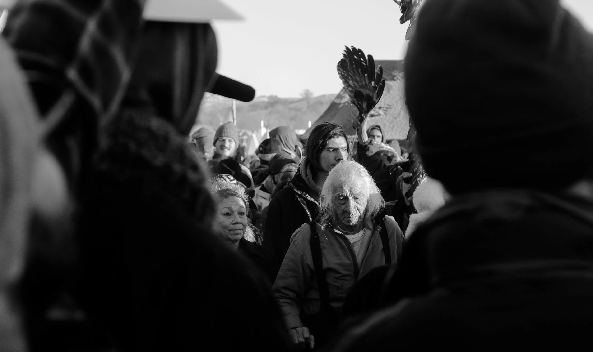 Elders dance around the sacred fire after the Army Corps of Engineers denied DAPL the permit to drill