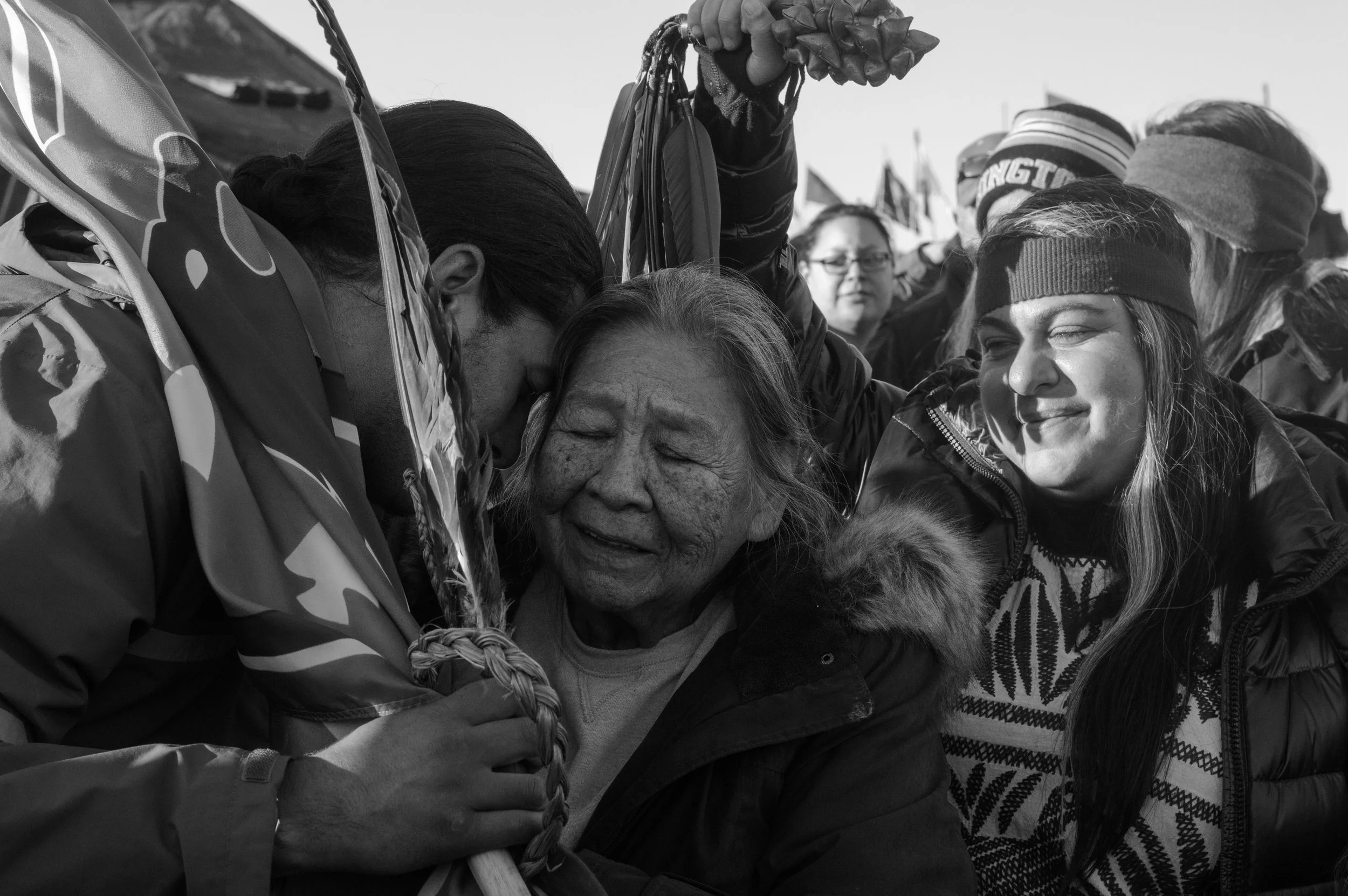 emotional embrace of a elder and veteran