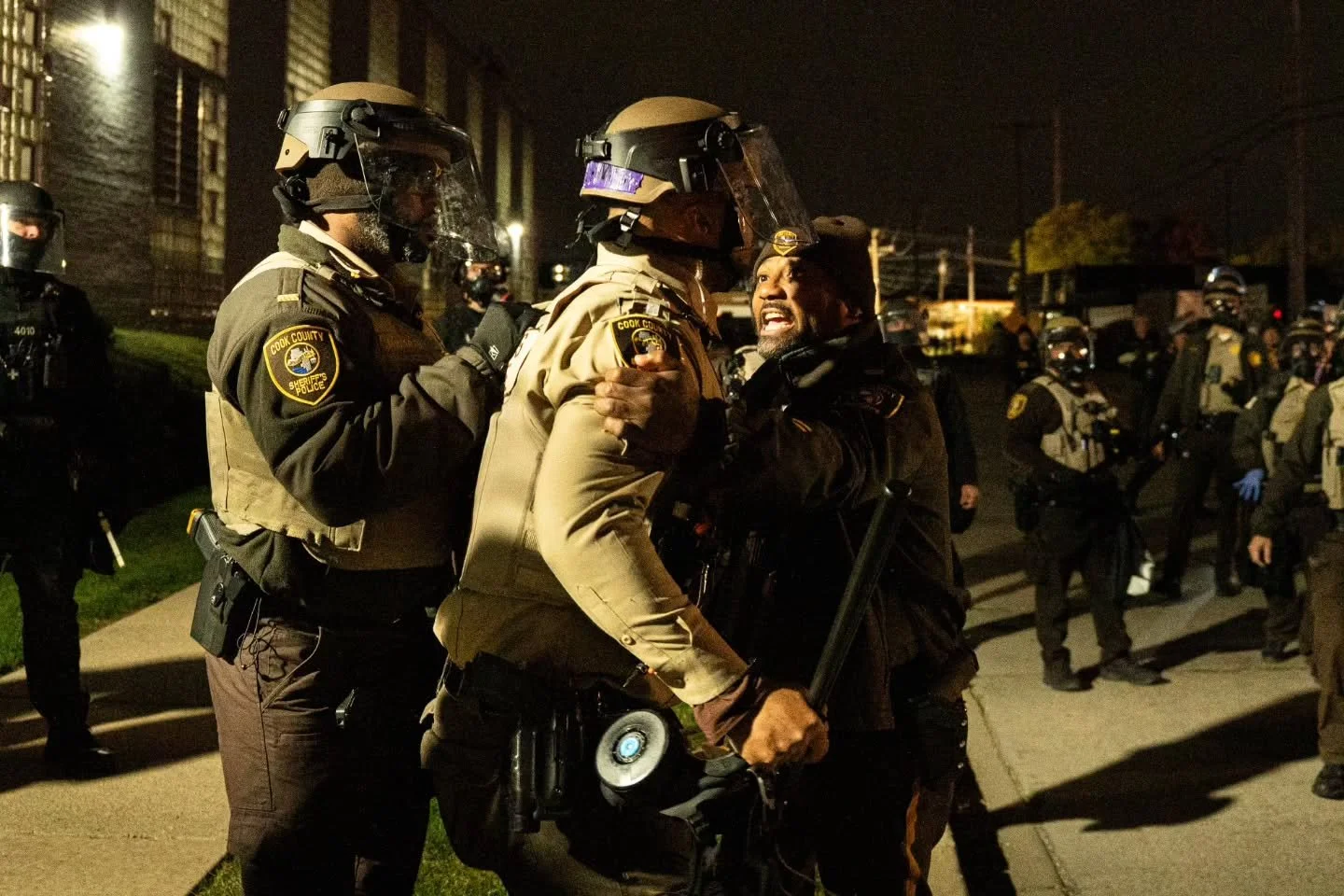 Final part photo series from November 1st outside the Broadview ICE facility during a Halloween costume protest.

The day began with people doing the &ldquo;Jericho walk&rdquo; at the crosswalk, exercising their right to occupy the sidewalk. State tr