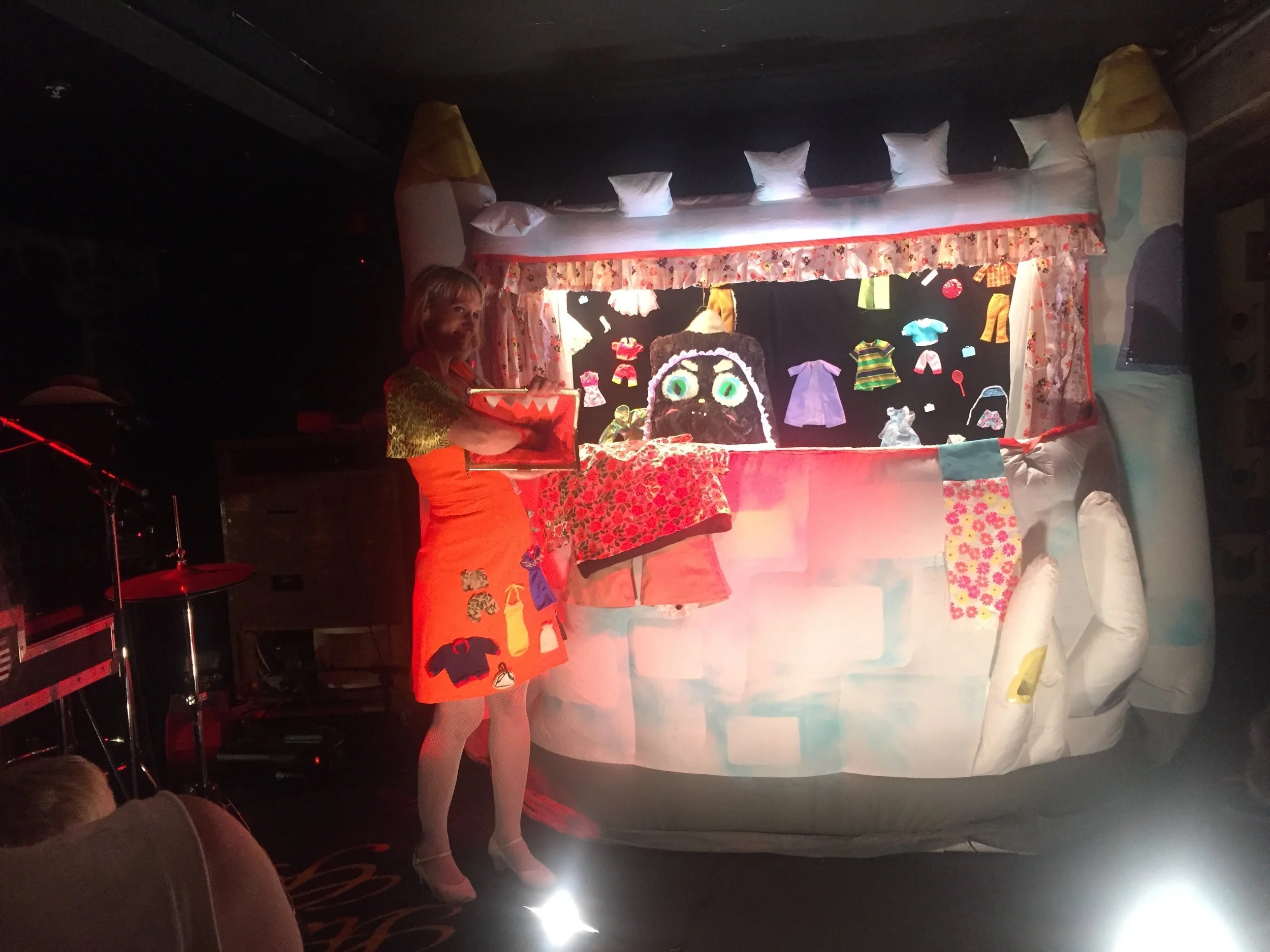 Miss Pussycat with the puppet-showcase-thing-booth she made 