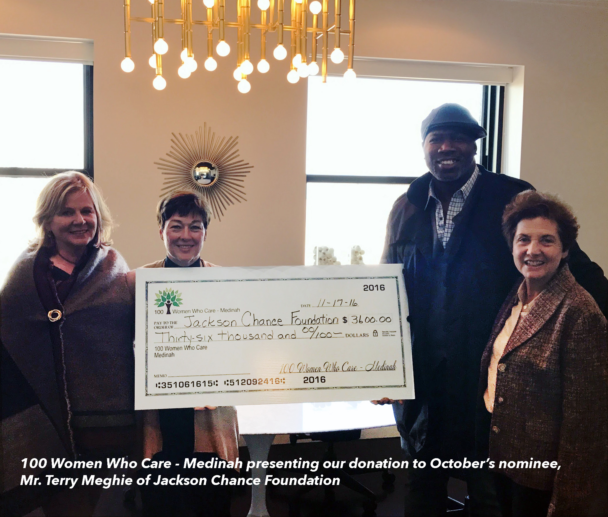 100 WWC-Medinah present our checks to co-founder and Jackson's father, Mr. Terry Meghie