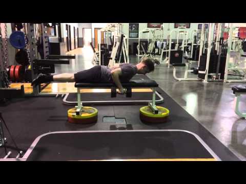 Prone Elevated Dumbbell Row