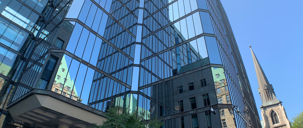 Glass reflections on the Bank of Canada: 45.421028, -75.703651