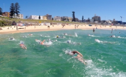 Racing back to the beach - it's fun & improves both your skills & fitness!