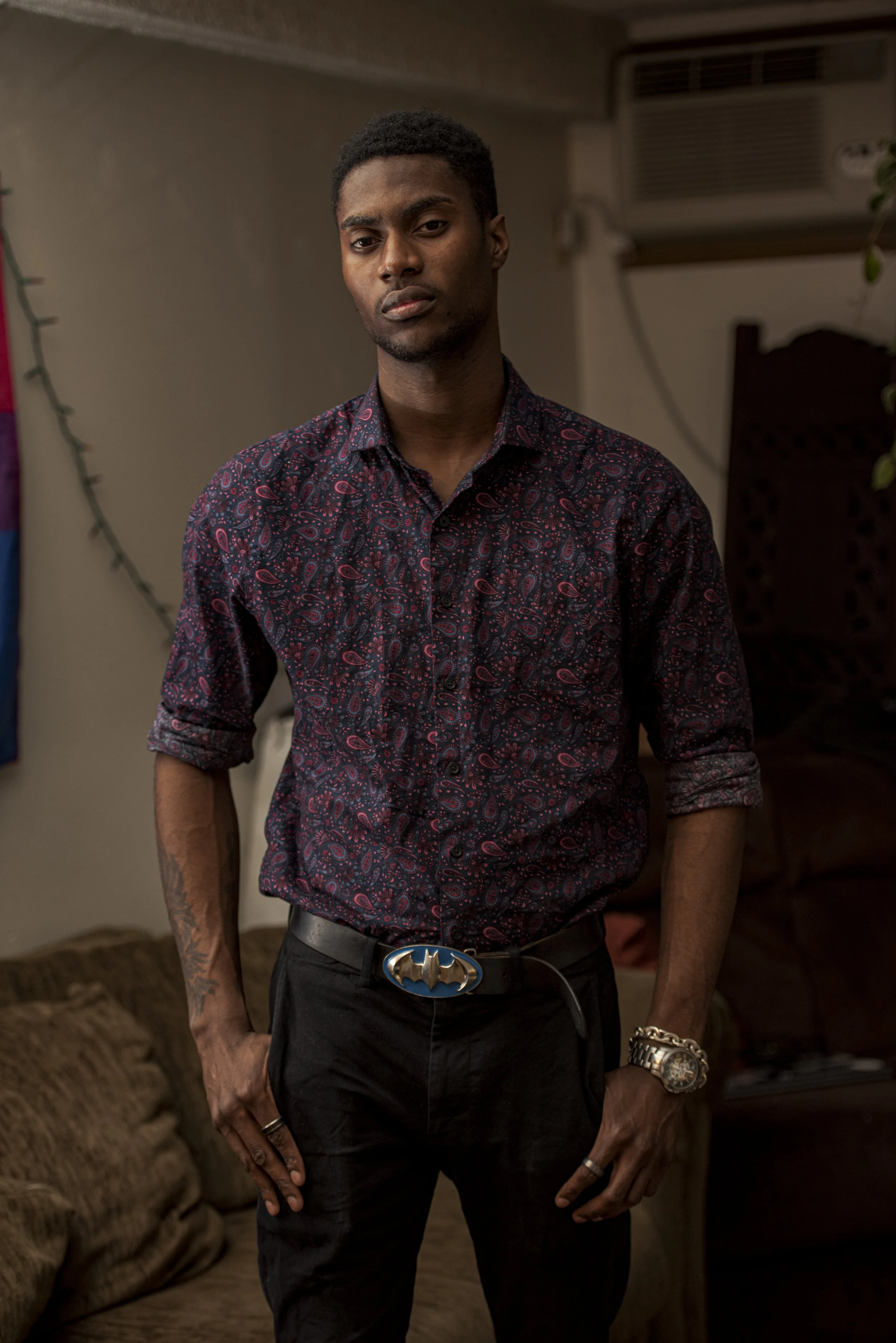  Wylliam Smith stands for a portrait at his apartment in Iowa City, Iowa on Friday, Jan. 31, 2020. Smith will graduate from the University of Iowa in the spring of 2020 and works two jobs as a cook and a waiter while pursuing a career as a writer. 