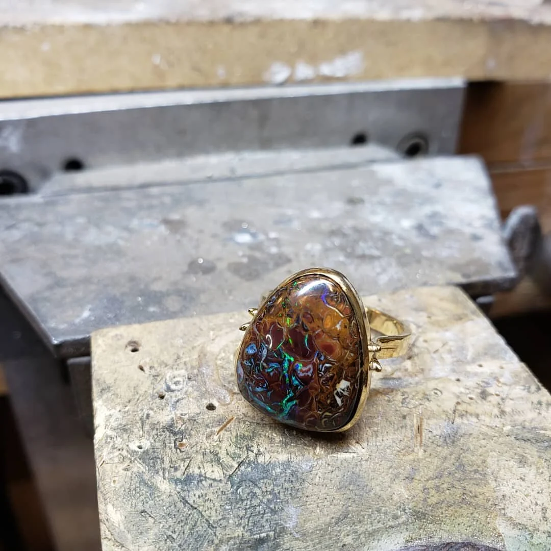 18k boulder opal hand fabricated snake theme cocktail ring