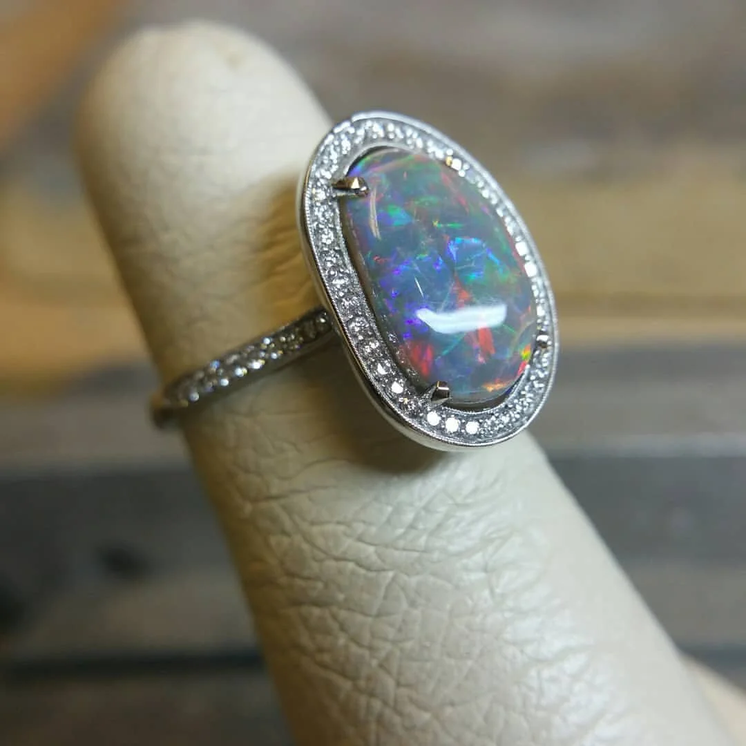 Platinum lightening ridge opal and diamond cocktail ring