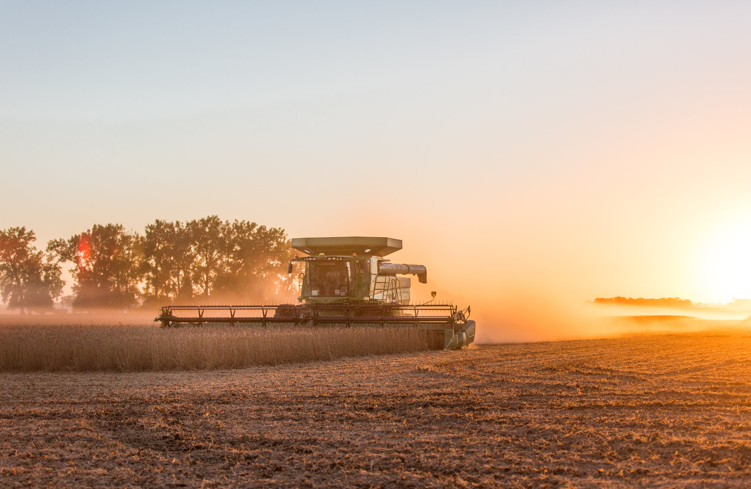 fall | harvest | sunset | john deere | combine | farming | midwest | dusk | bean harvest | stephanie lynn photography
