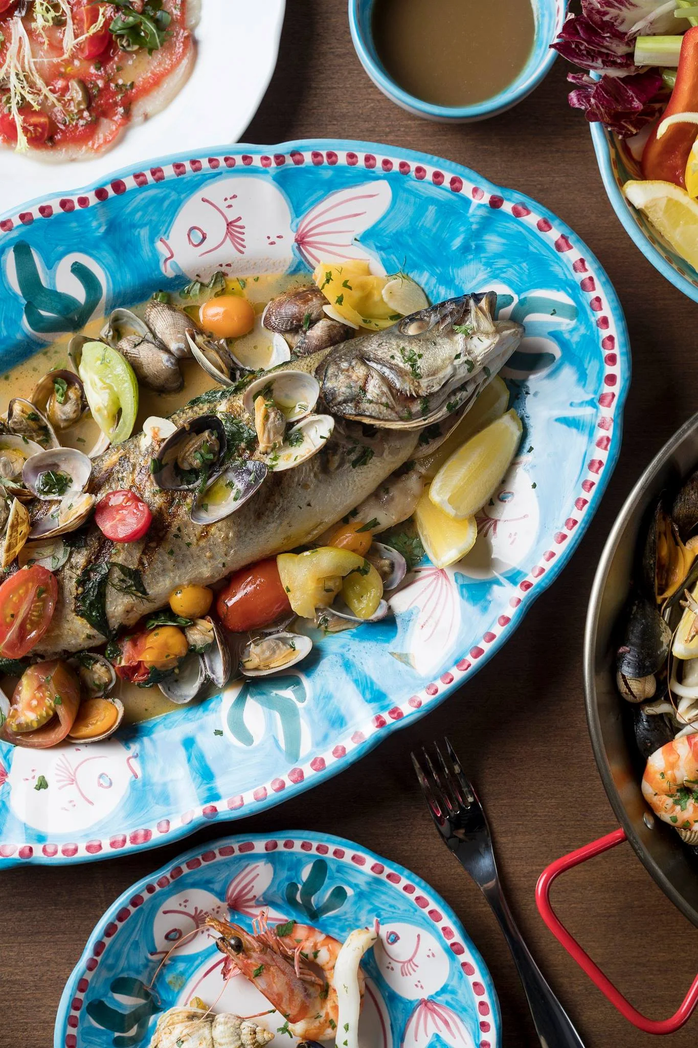 181016 Dish-Branzino Acqua Pazza served with fresh clams, olives and cherry tomatoes..jpg