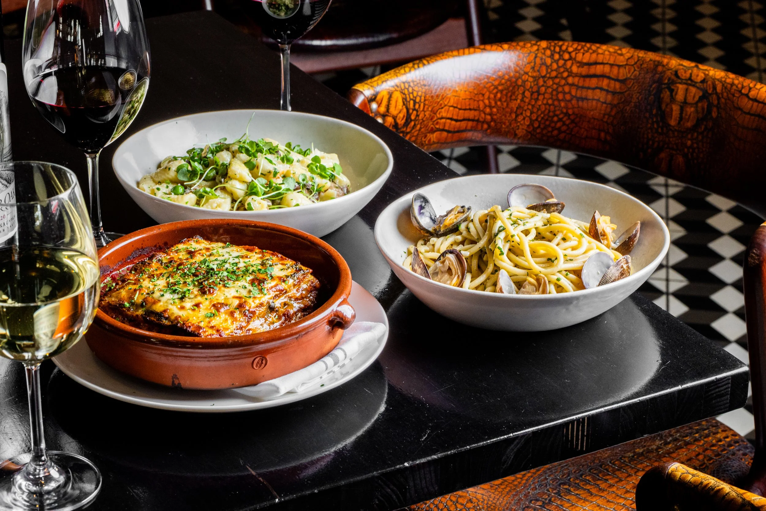 Lasagna, Gnocchi, Linguini and Clams on Table.jpg
