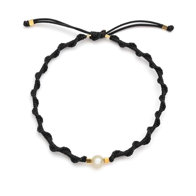 Cultured pearl with 18k gold vermeil or silver beads. Braided with adjustable lock. Exclusive at @storm_copenhagen