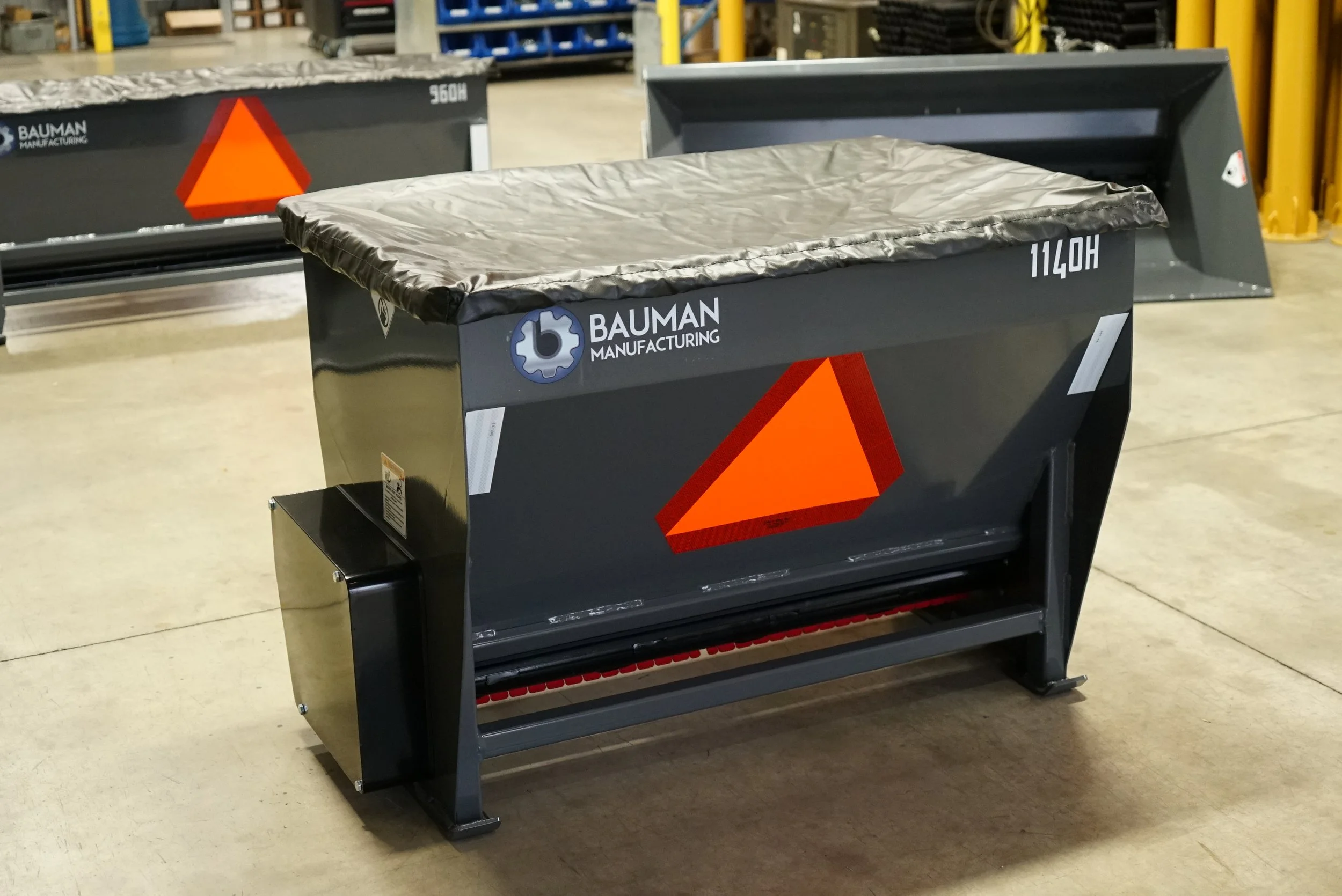 Bauman 1140 Drop Spreader – heavy-duty stainless design built for agricultural and commercial applications.