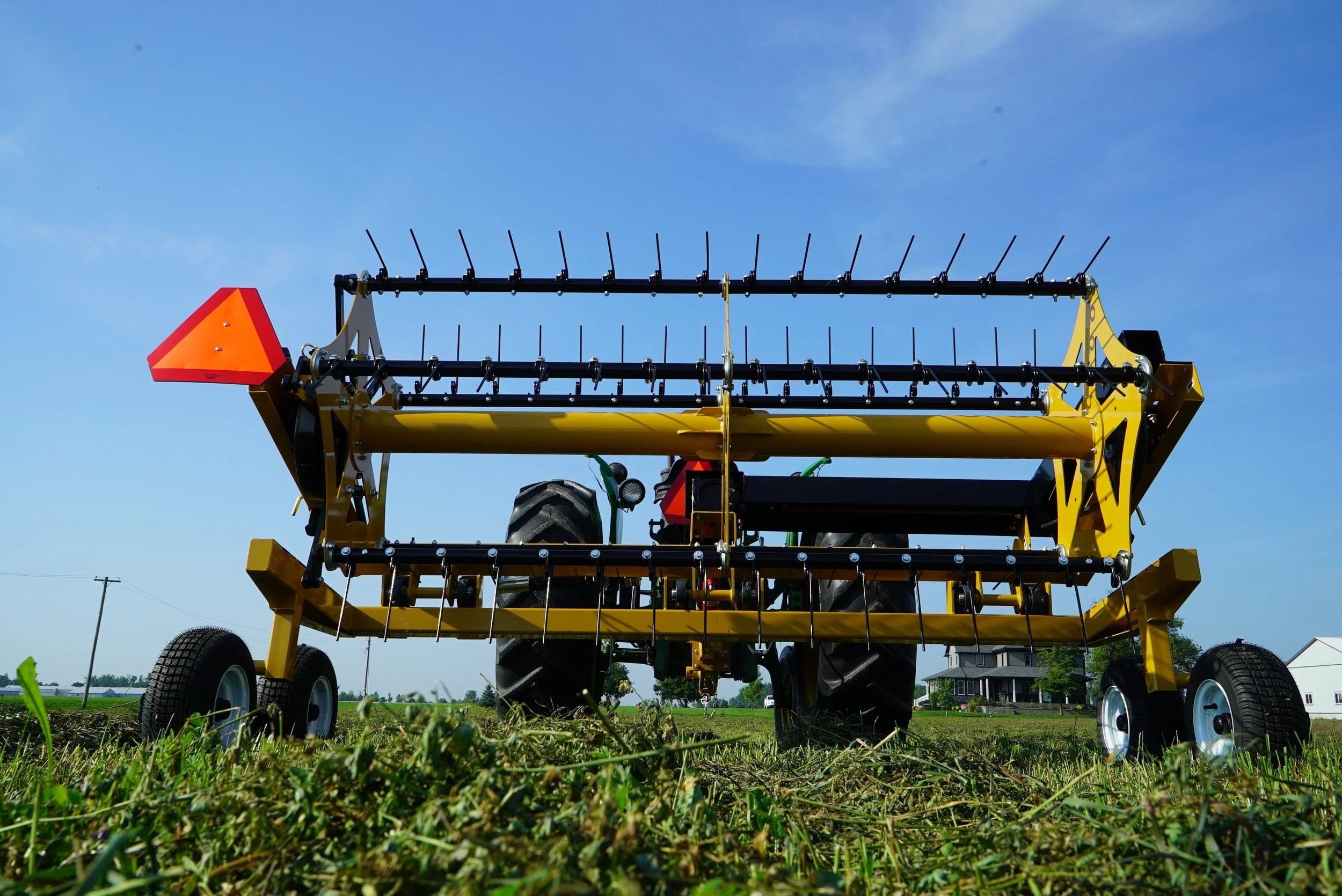 Hay Fluffer Tedder – designed to increase hay drying efficiency and maintain crop quality.