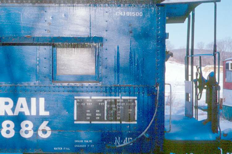 This detail shot at Horseheads, NY on February 17, 1980 shows the No. 18886 misidentified as the former CNJ No. 91500. However, the icicle-laden awnings over the windows are a distinctively L&NE feature on these cabooses - a feature that original CNJ cars lacked. (Karl Geffchen photo)