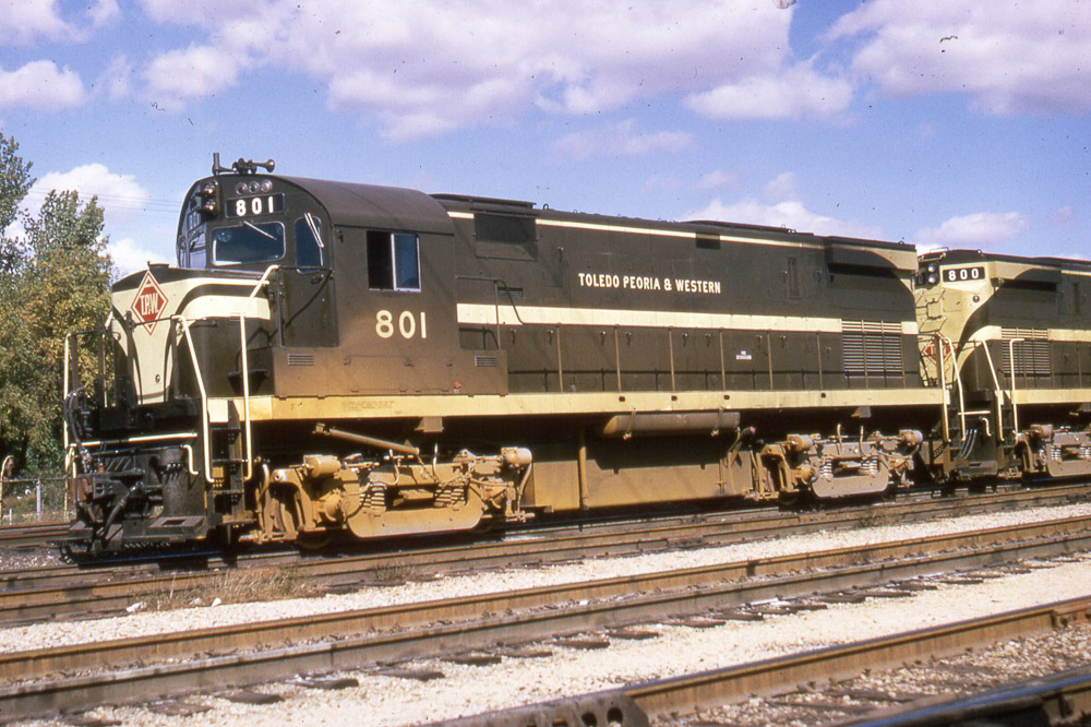 TP&W No. 801 is pictured here in East Peoria, IL on October 4, 1964, only a month after delivery. Twin unit, No. 800, is seen off the right. (Al Chione photo, Larry Irvin collection)
