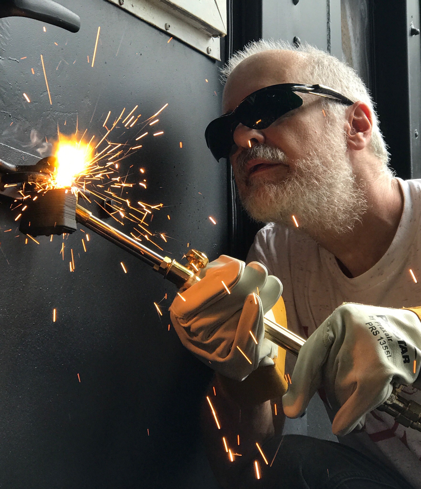 Steve Falco test drives the new torch on a broken lock.