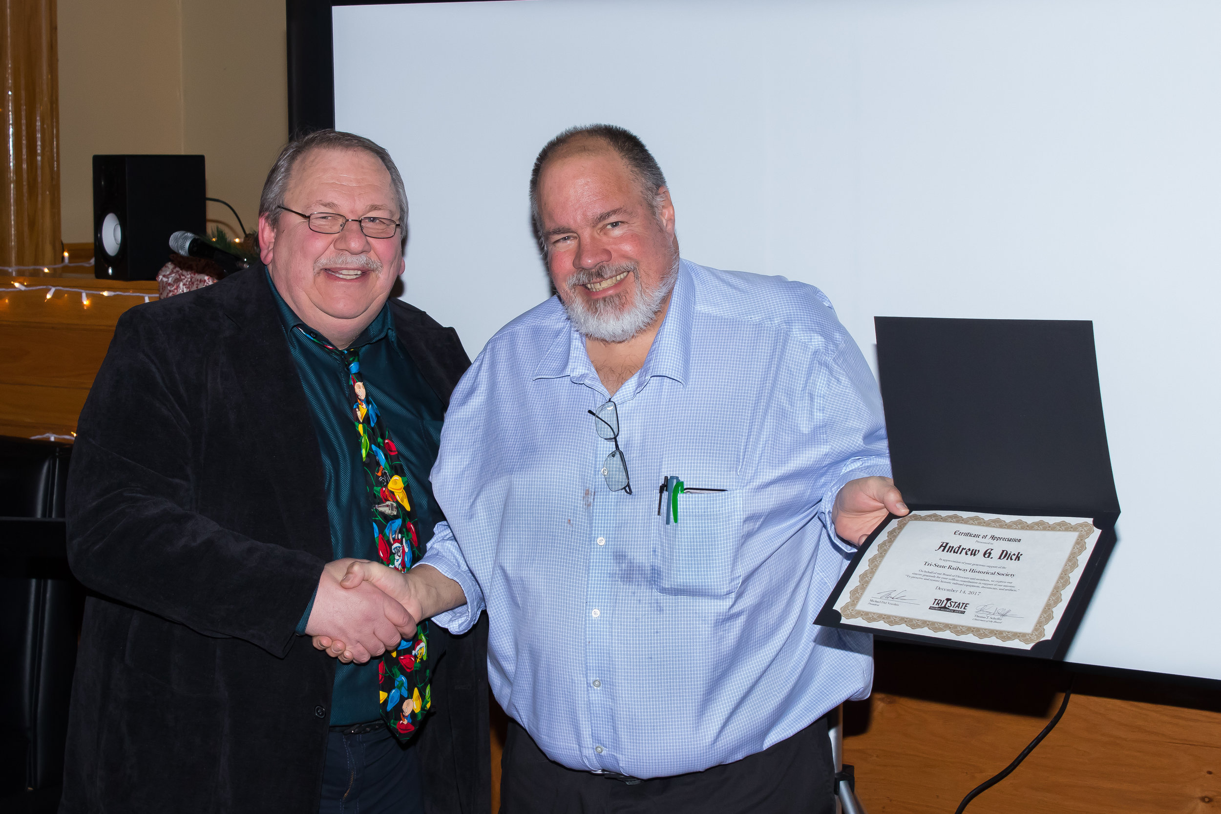 Member Andrew Dick receives a donor Certificate of Appreciation