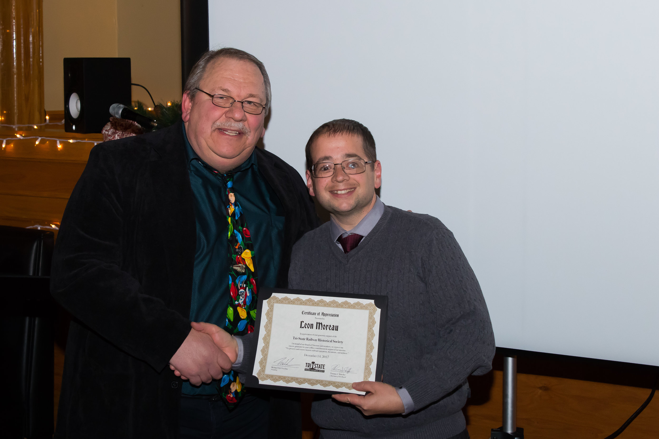  Member Leon Moreau receives a donor Certificate of Appreciation 