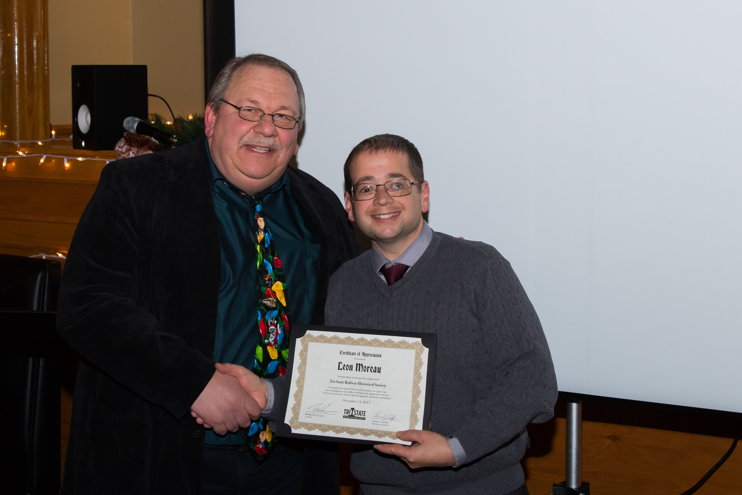 Member Leon Moreau receives a donor Certificate of Appreciation