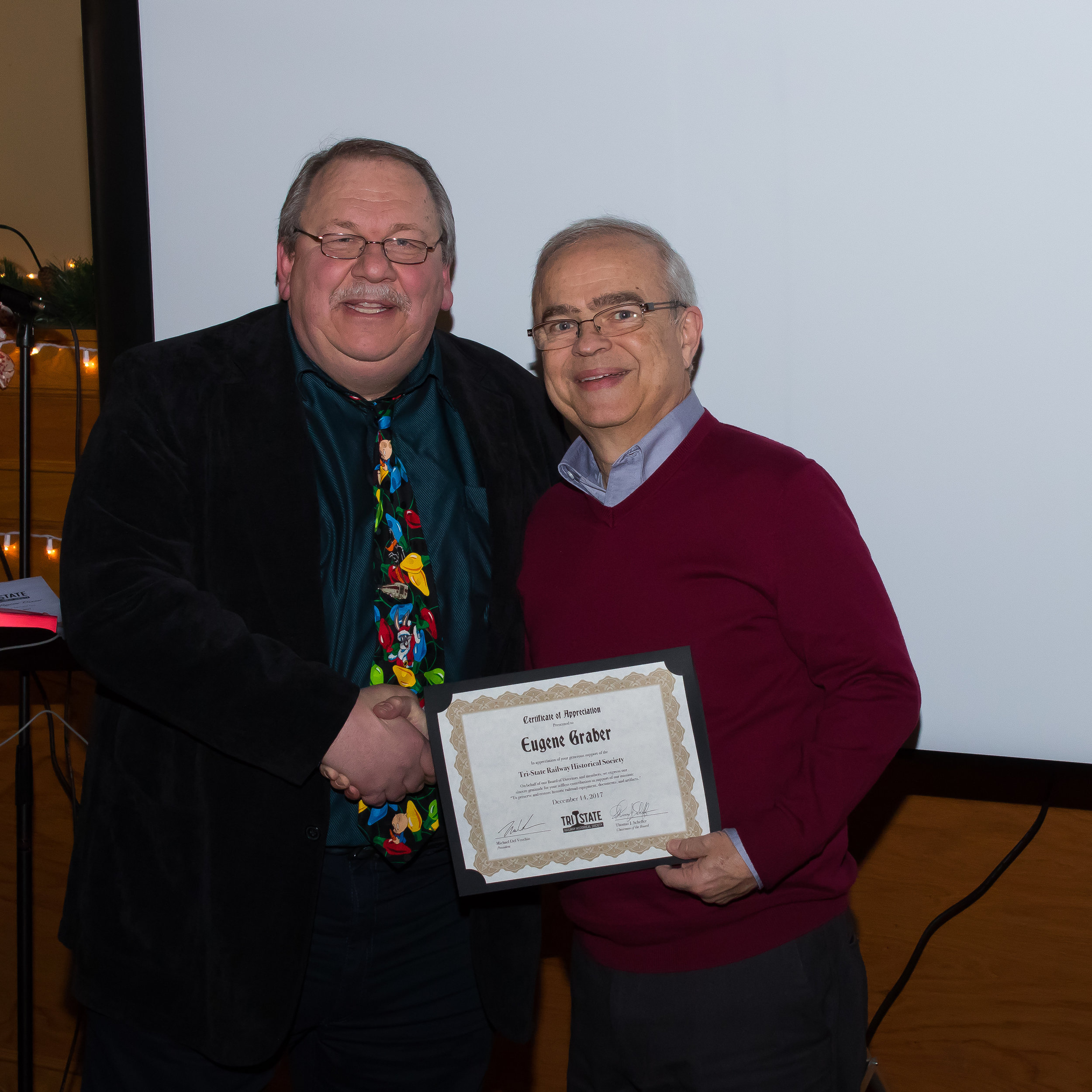  Member Eugene Graber receives a donor Certificate of Appreciation 