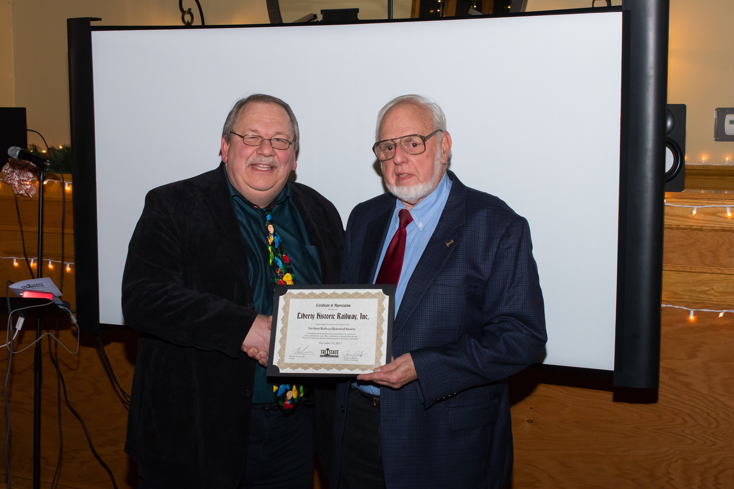  Member William McKelvey receives a donor Certificate of Appreciation on behalf of Liberty Historic Railway 