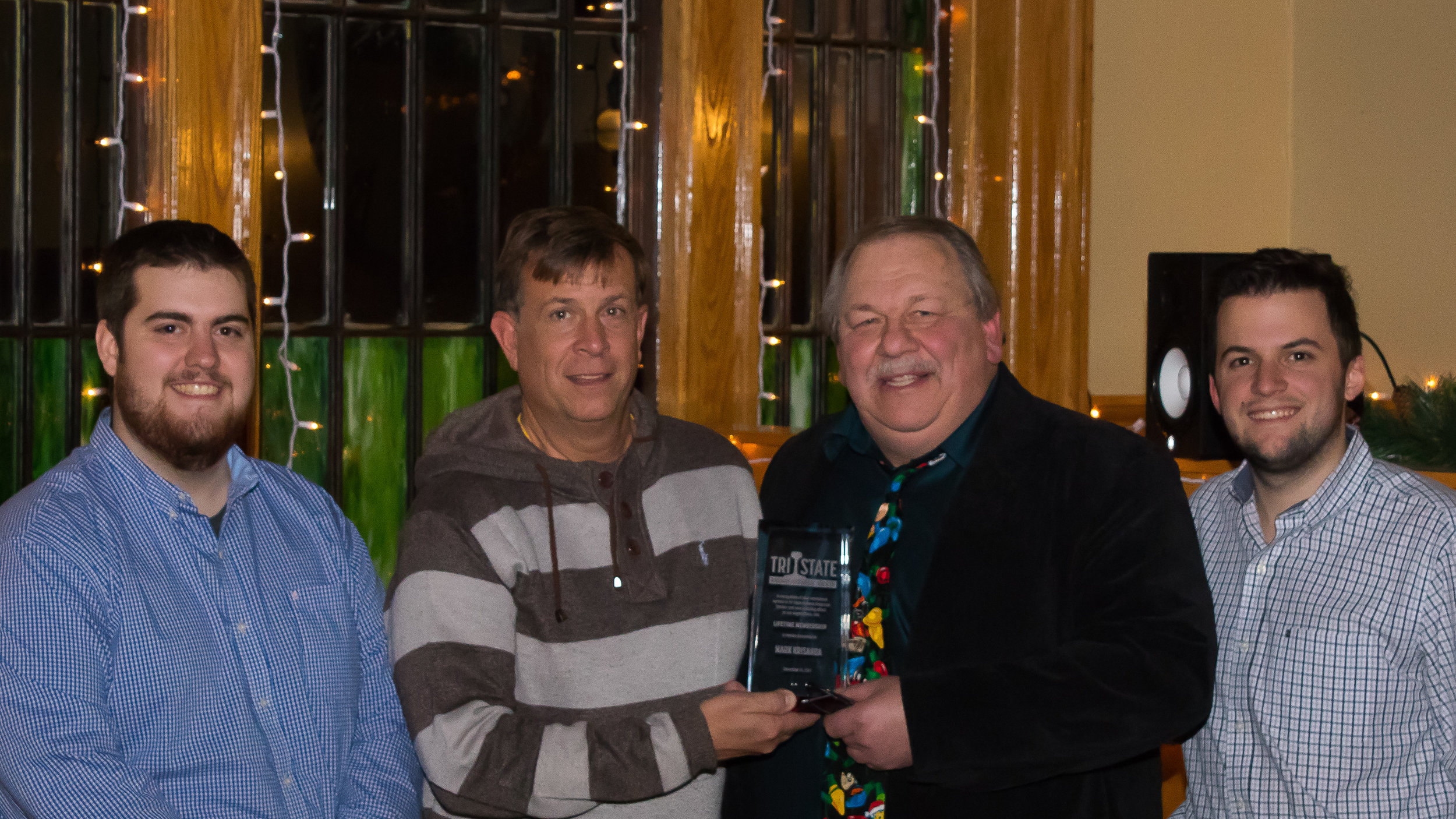 Member Mark Krisanda receives his Lifetime Membership award. From Left to right, Vice President Kevin Phalon, Mark Krisanda, President Michael Del Vecchio, and Treasurer Richard King.