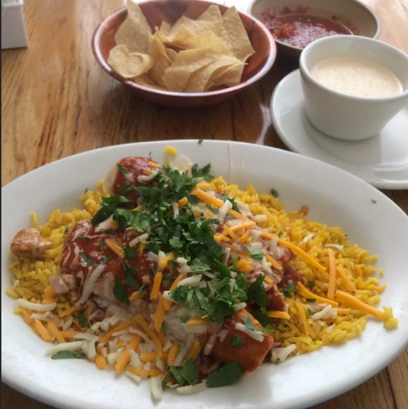 La Fonda Salmon Enchiladas (only rice), queso, chips, & Salsa 