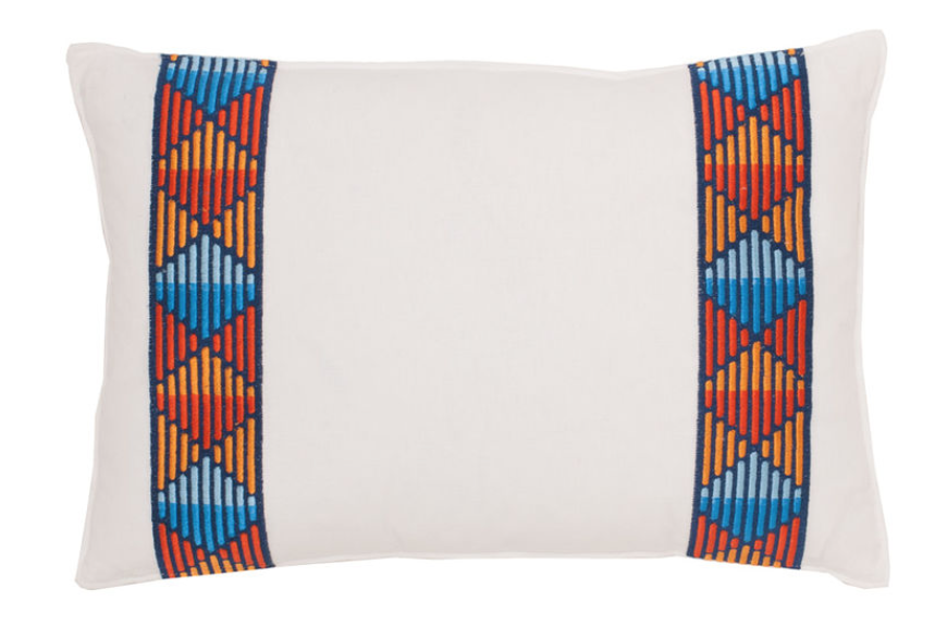  One of the embroidered decorative pillows. 