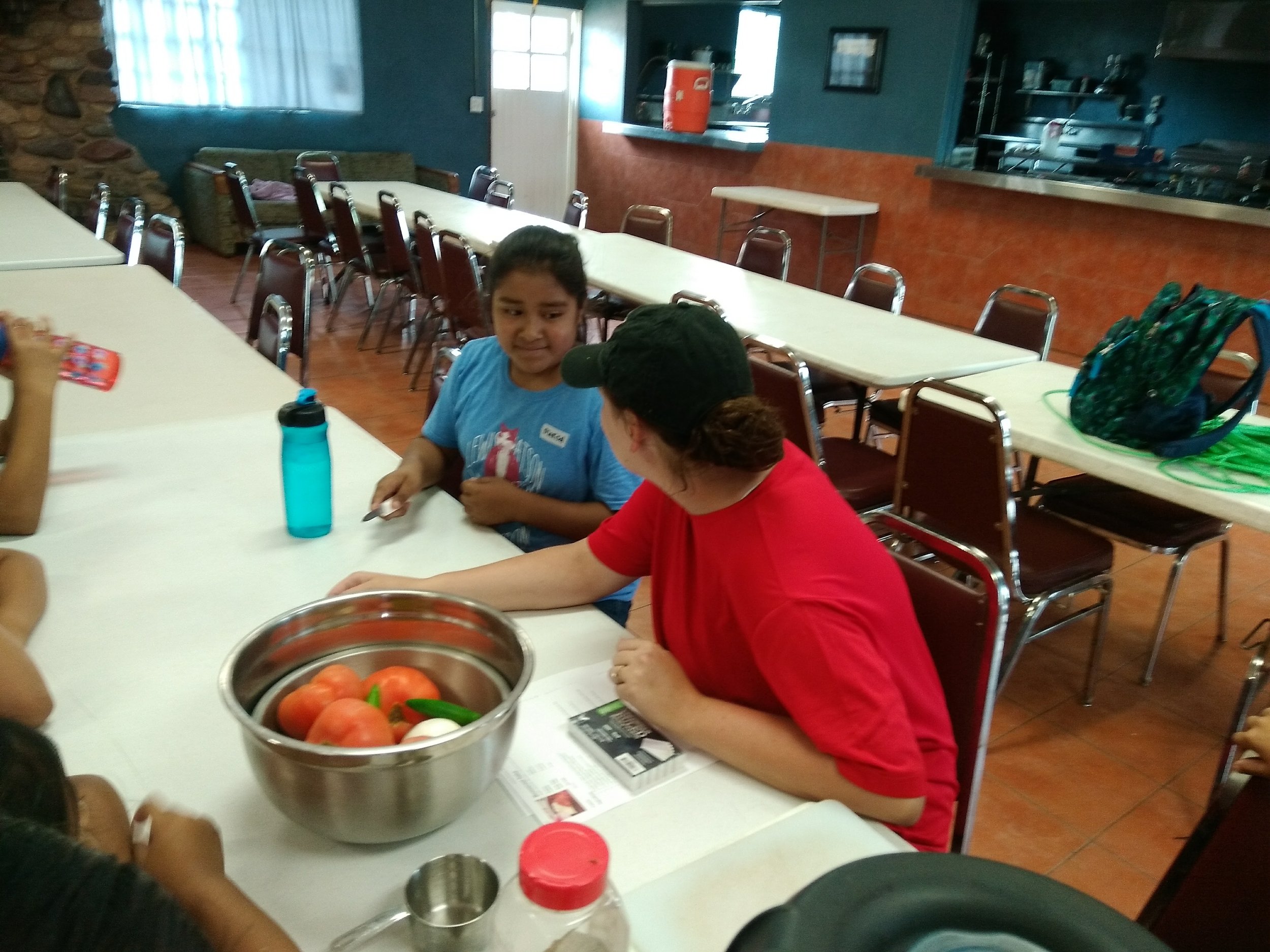 Teaching proper knife use in Salsa class.