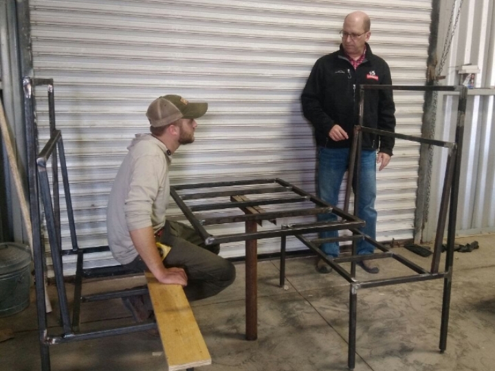 Booths are being made by Adam Kaeb who is visiting in Magdalena for a few weeks.