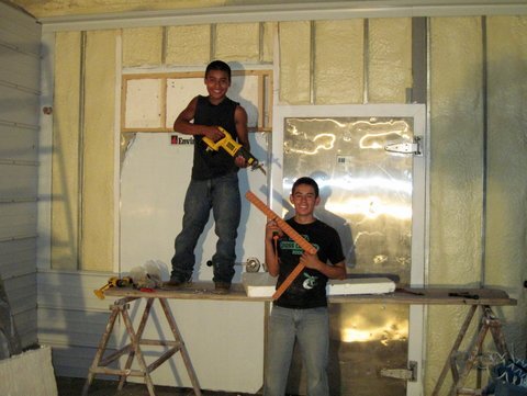Uriel and Fede help with construction