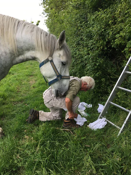 As Roger prepares to weigh the youngsters, a passer-by shows interest