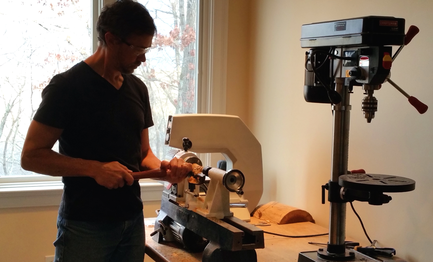 Nathan Tocus at work on the lathe