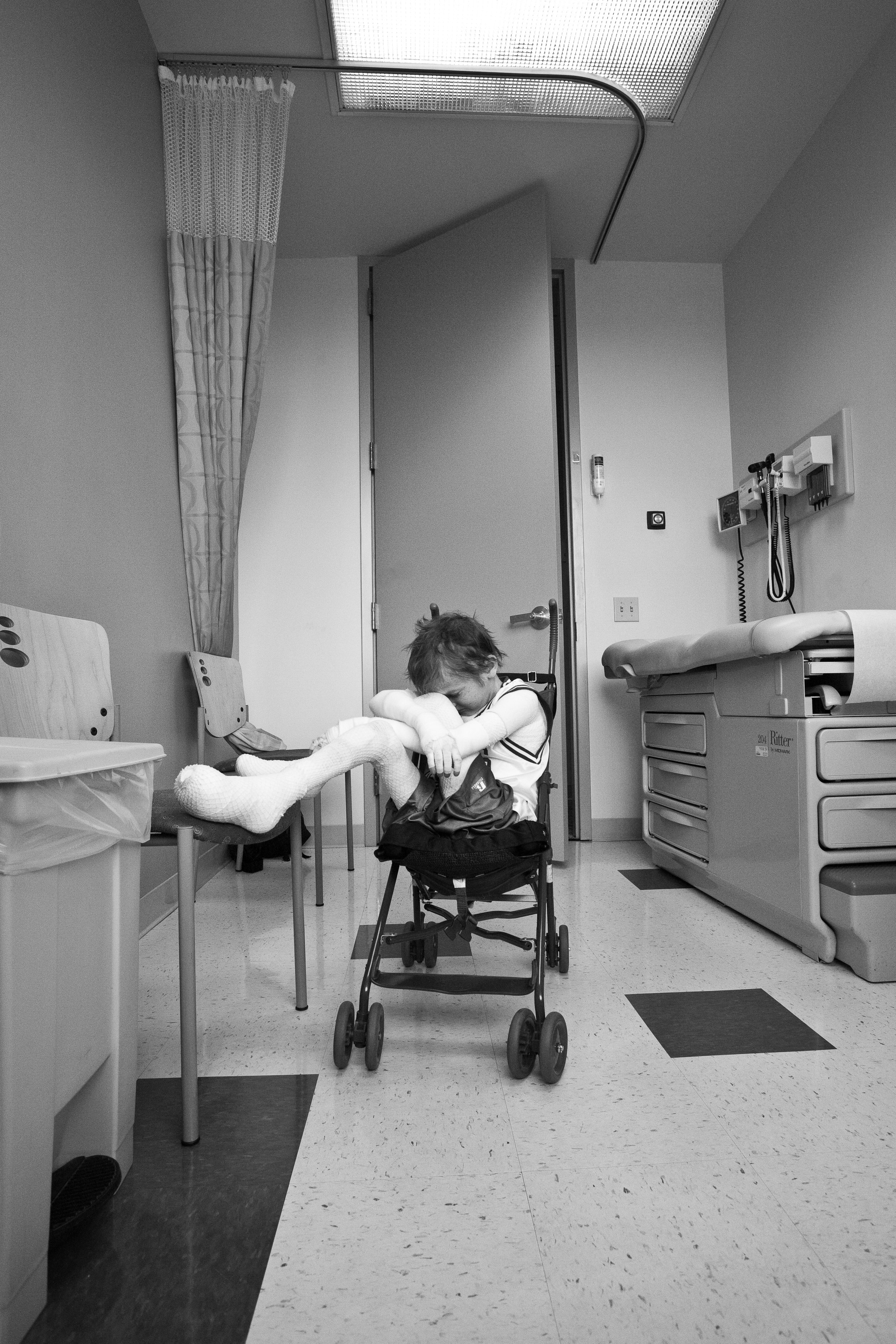  During a routine visit to the clinic, Garrett's mom leaves him alone for a moment to speak with a nurse. Garrett isn't particularly happy to be there. These doctor visits are extremely tiring for Garrett and his mom. During this visit they will spen