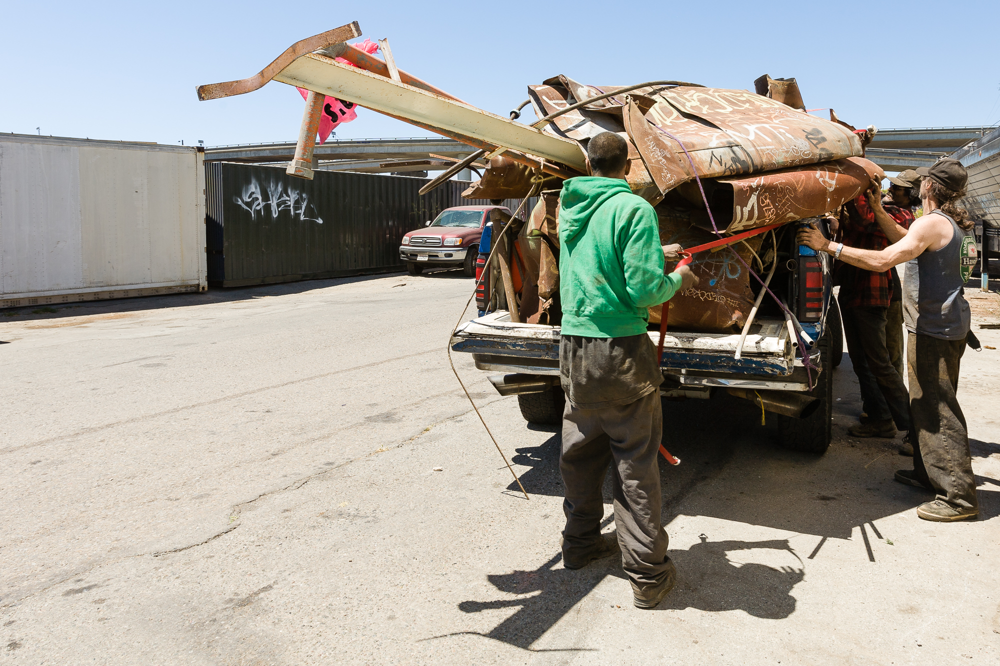  Loading the truck with the collected scrap is a group effort. It must be done quickly and efficiently. The more metal that gets hauled away the more money each person earns at the end of the day. 