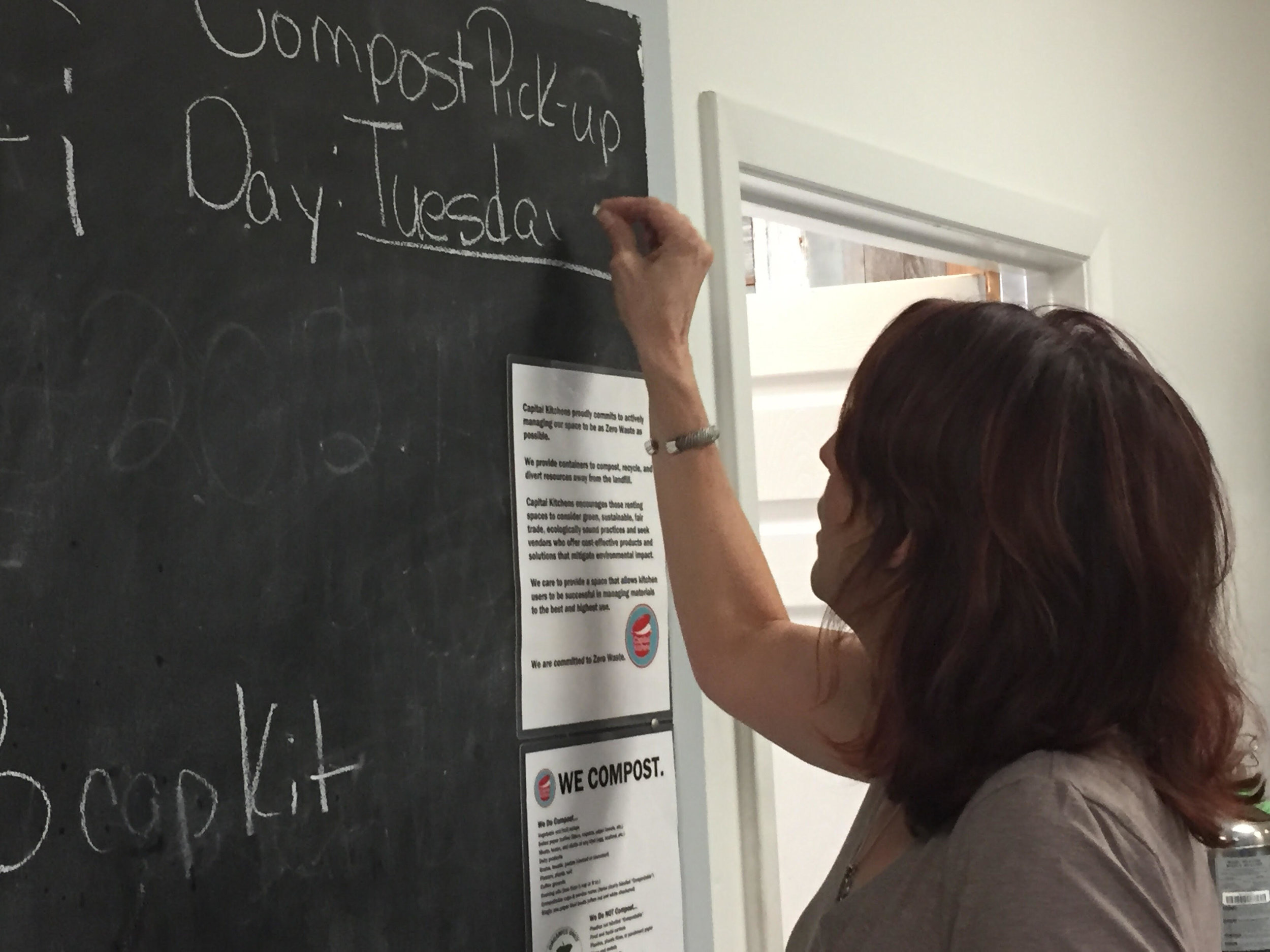 Capital Kitchens owner, Trish Wesevich, makes the site's new composting program official!