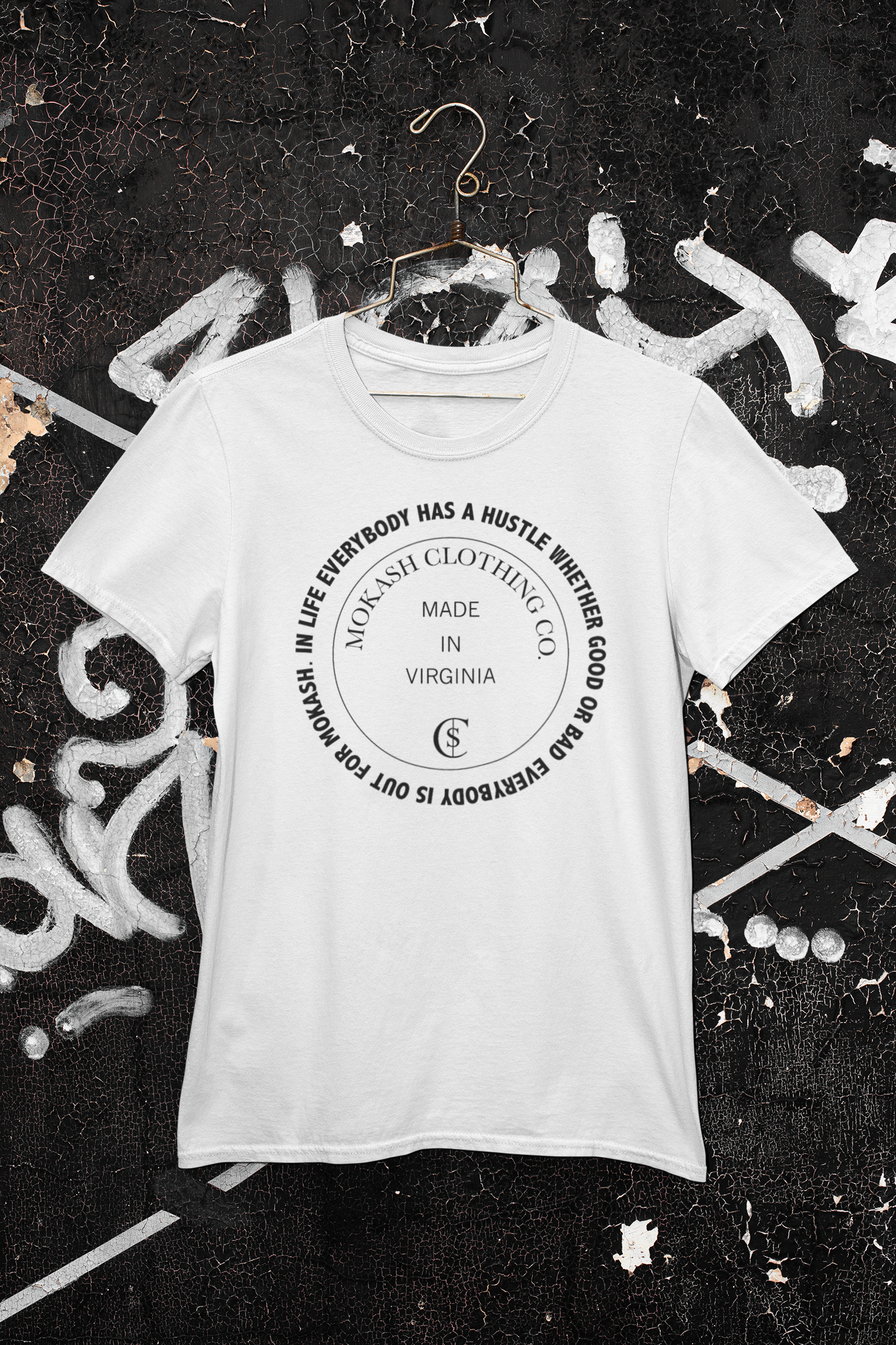 mockup-of-a-customizable-t-shirt-hanging-against-a-graffitied-wall-m447.png