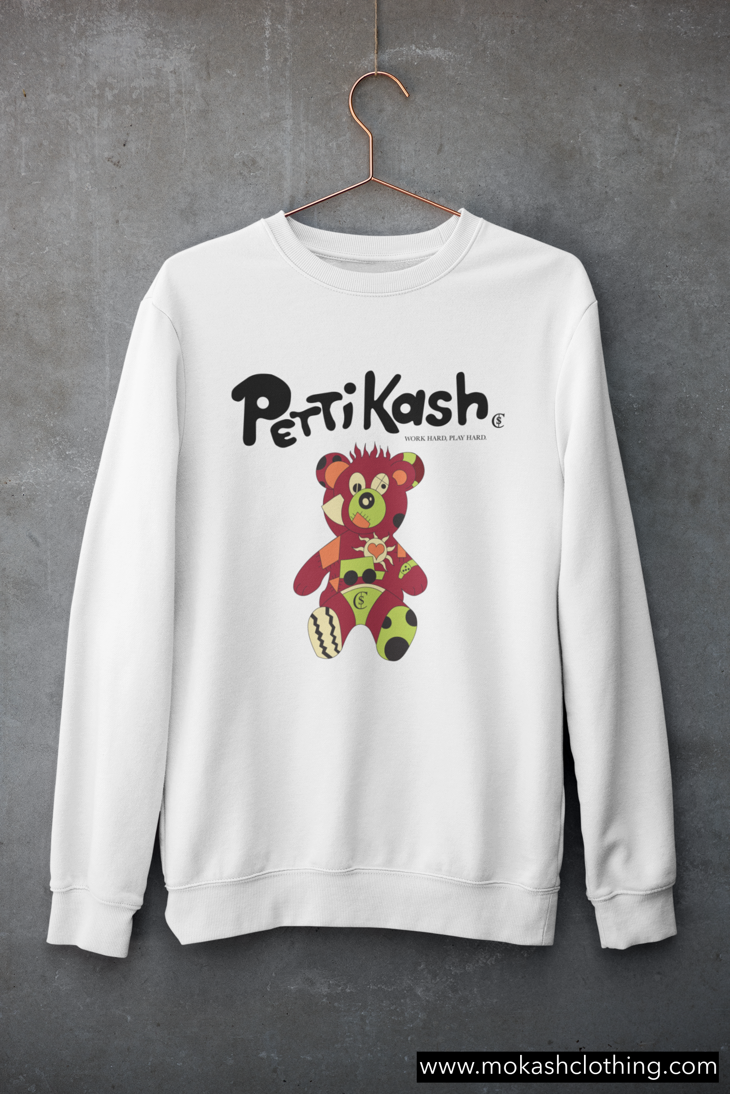 mockup-of-a-customizable-crewneck-sweatshirt-hanging-against-a-concrete-wall-33997 copy.png