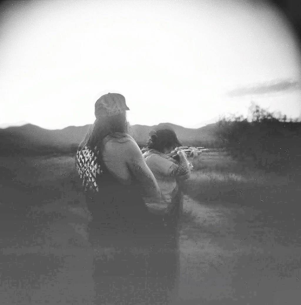 Ali & Sid, 2022. 
Black-and-white photograph, Holga camera.