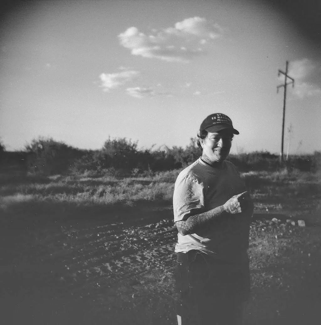 Ali in Desert, 2022.
Black-and-white photograph, Holga camera.