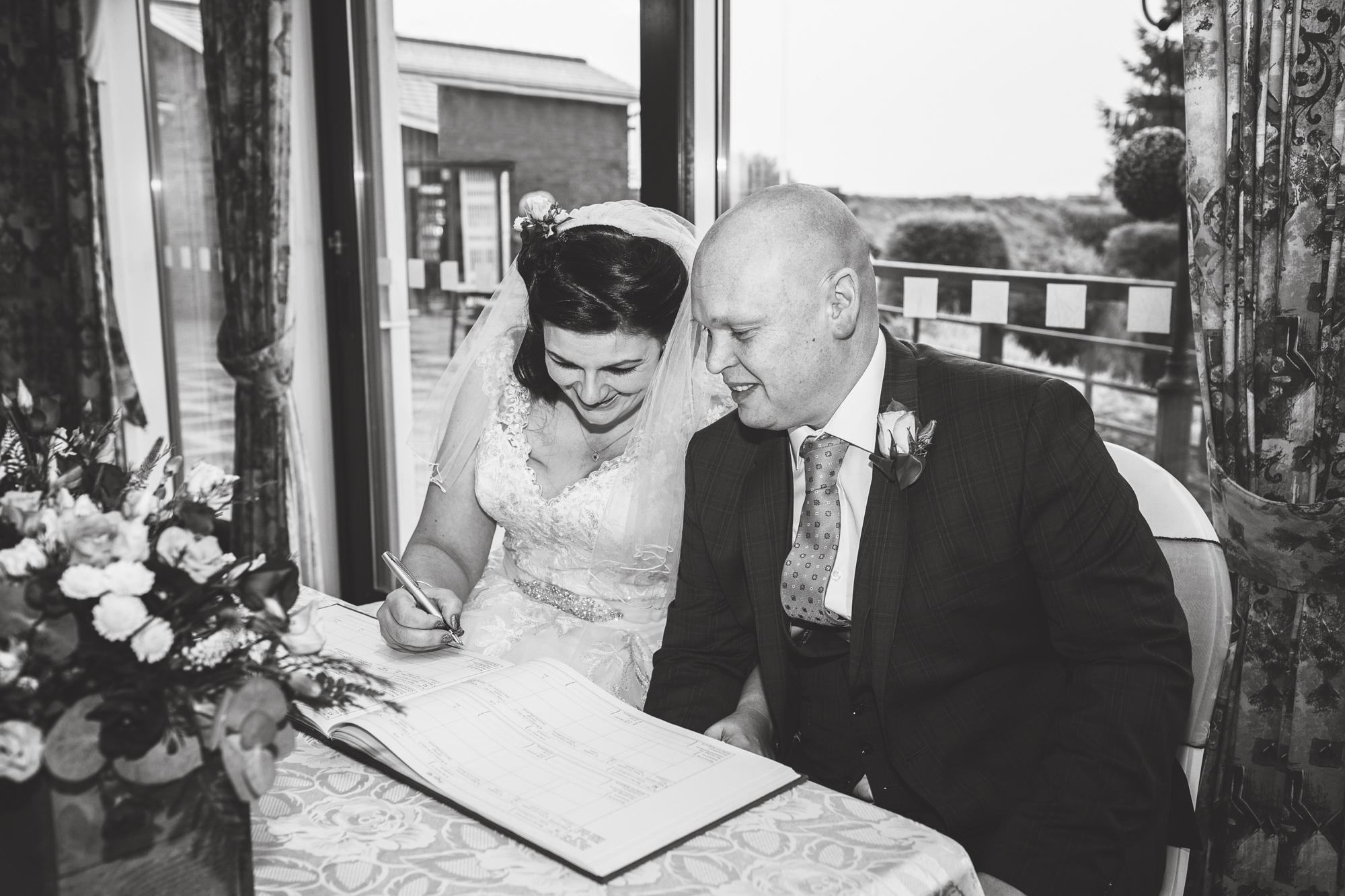 signing the register at pontypridd golf club wedding