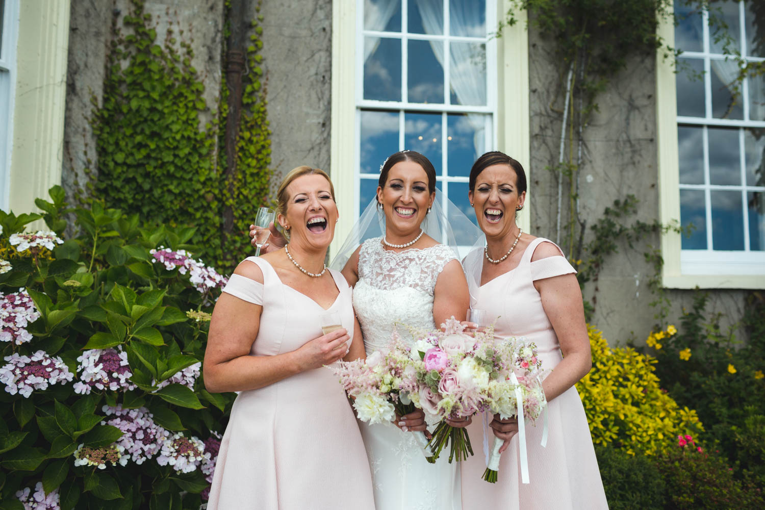 Bride and her bridesmaids and sisters at The New House Country Hotel, Thornhill, Cardiff with South wales wedding photographer photos