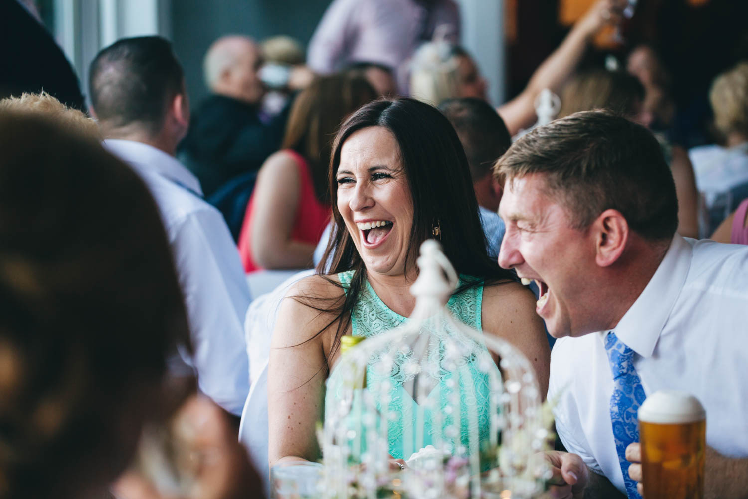 Laughing guests at The New House Country Hotel, Thornhill, Cardiff with South Wales wedding photographer